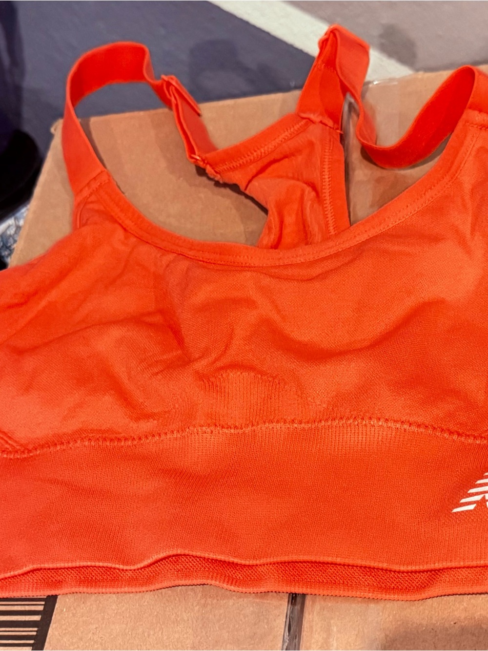 New Balance Bright Orange Racerback Sports Bra